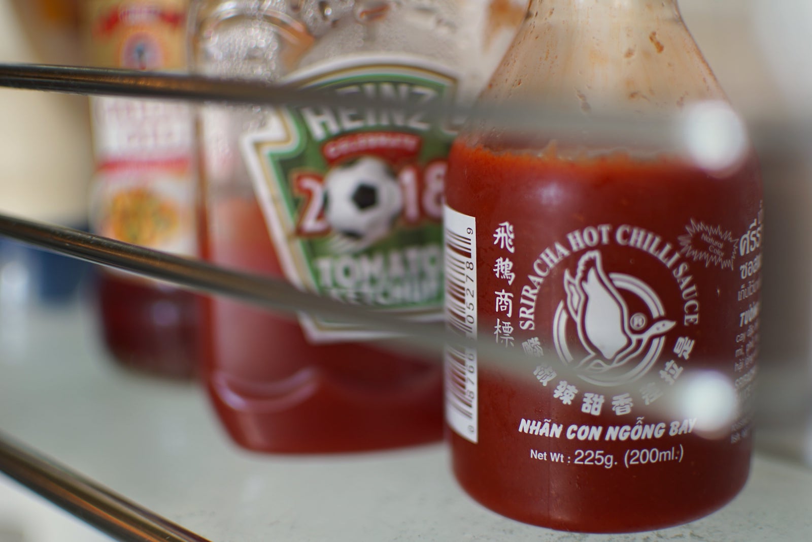 Sriracha sauce inside a fridge
